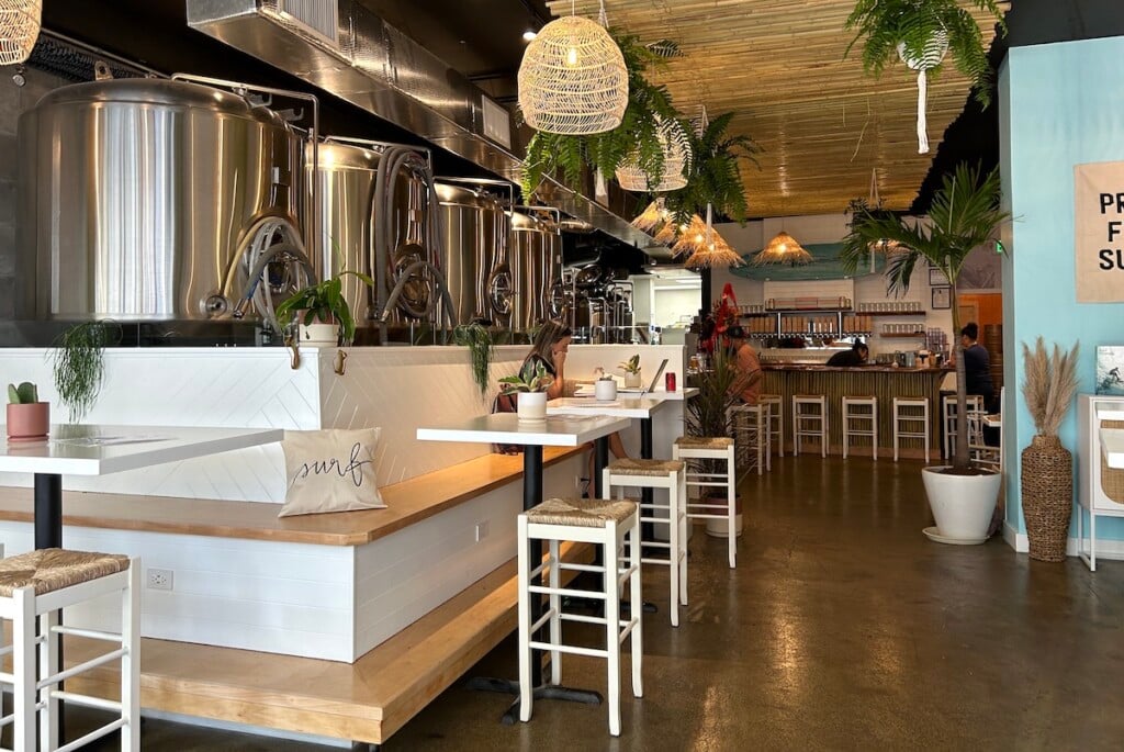 beer vats behind a white counter