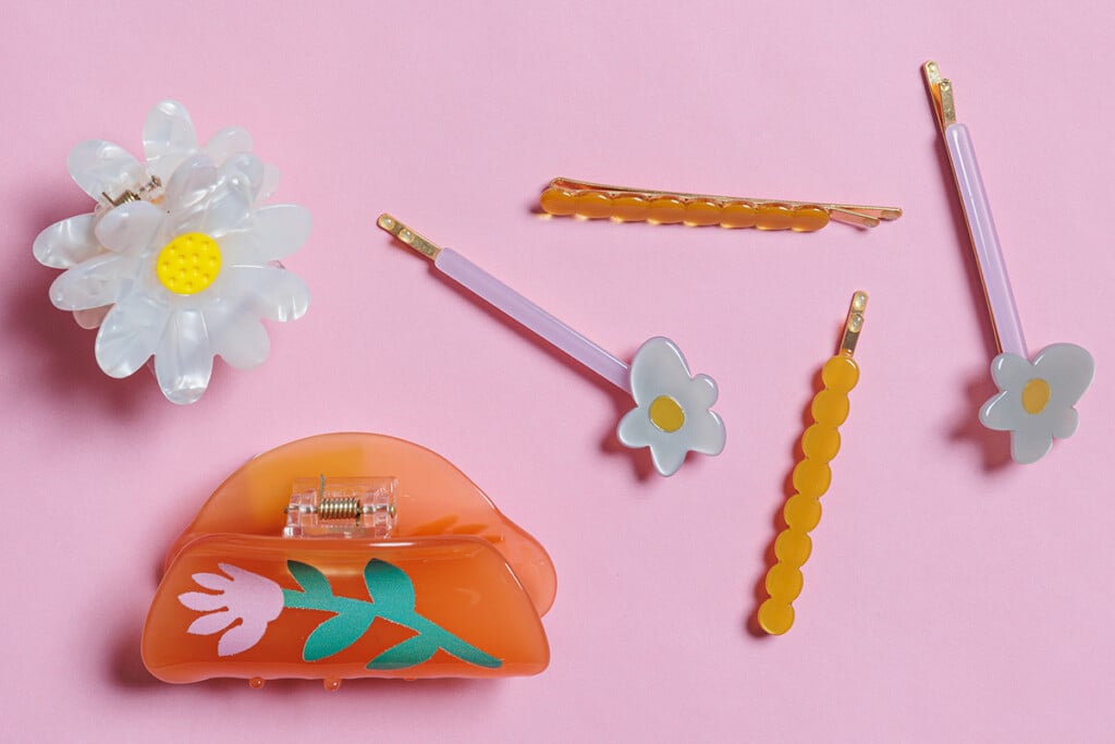 Madewell Girl's Day hair clips pink background paper
