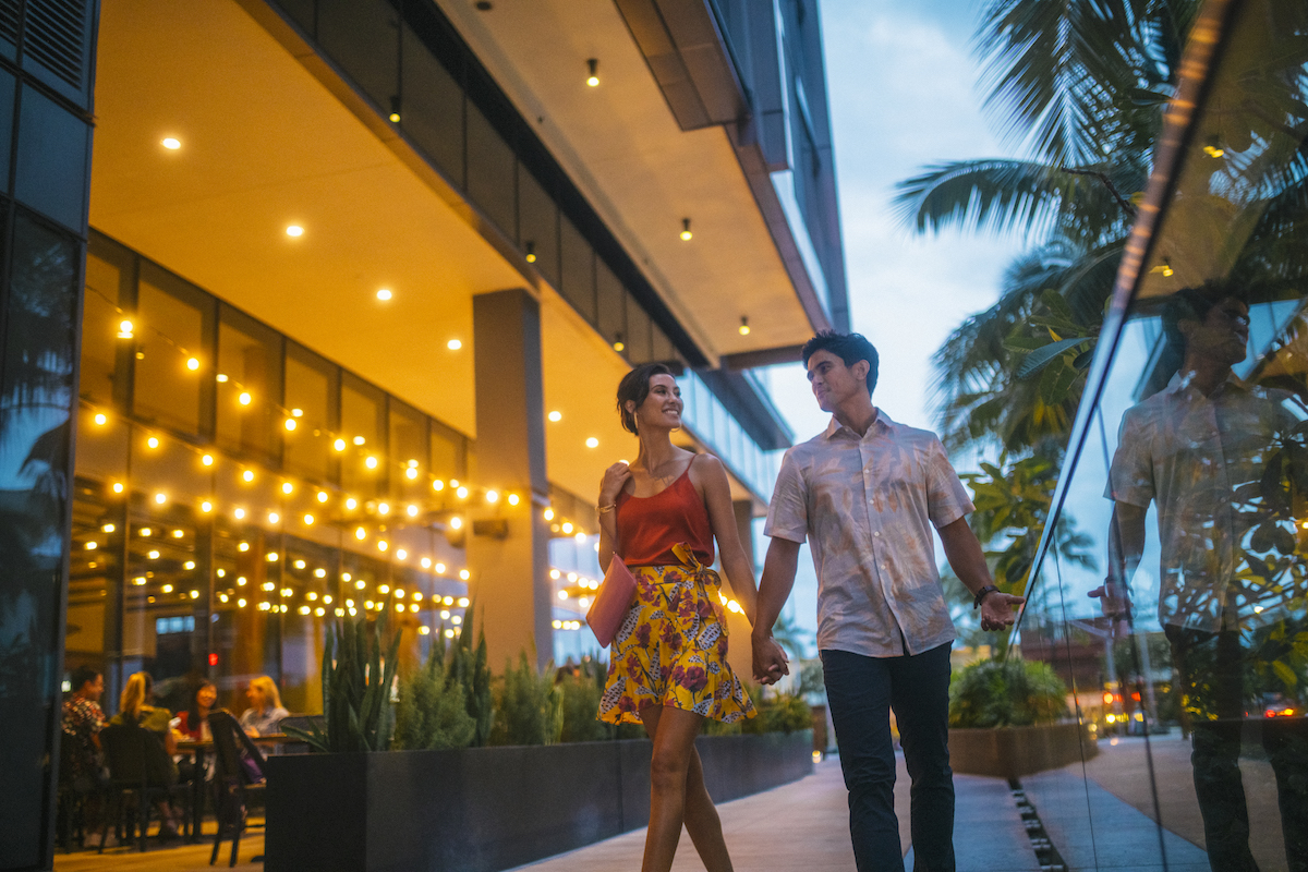 couple walking outstide of restaurant